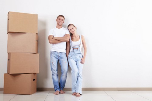 Student removals team preparing a move in Camden near a busy London street