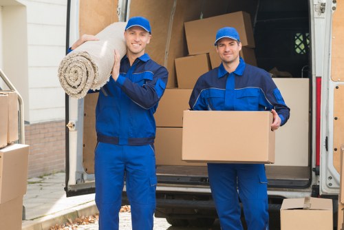 Commercial moving team handling office equipment in Camden