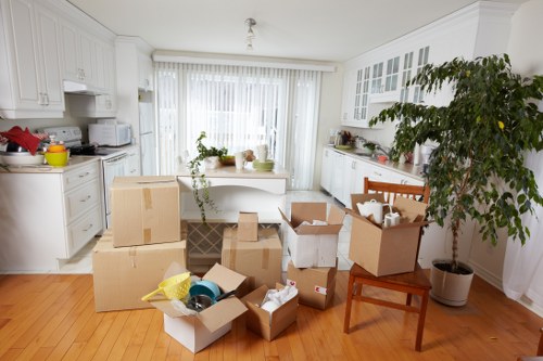 Man and van loading furniture for a Camden move