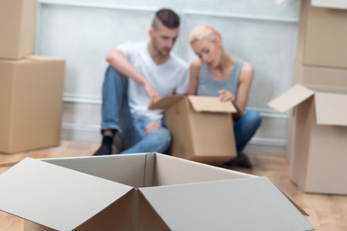 Camden office relocation process with packed boxes and furniture