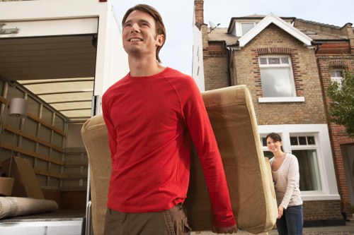 Professional movers handling student furniture in Camden
