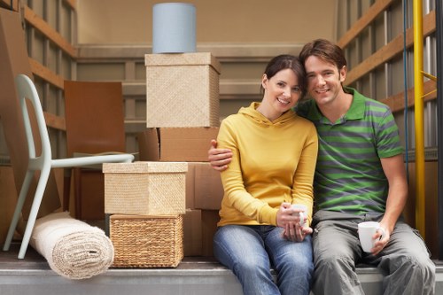 Careful furniture moving through a Camden property with stairs