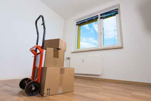 Professional office relocation team handling equipment in Camden