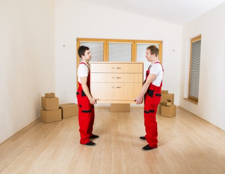 Packed moving boxes ready for a man with a van in Camden