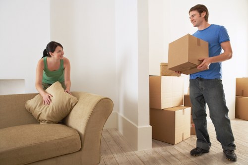 Professional Camden movers loading furniture into a truck